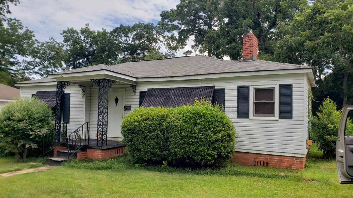 Exterior and new porch before remodel