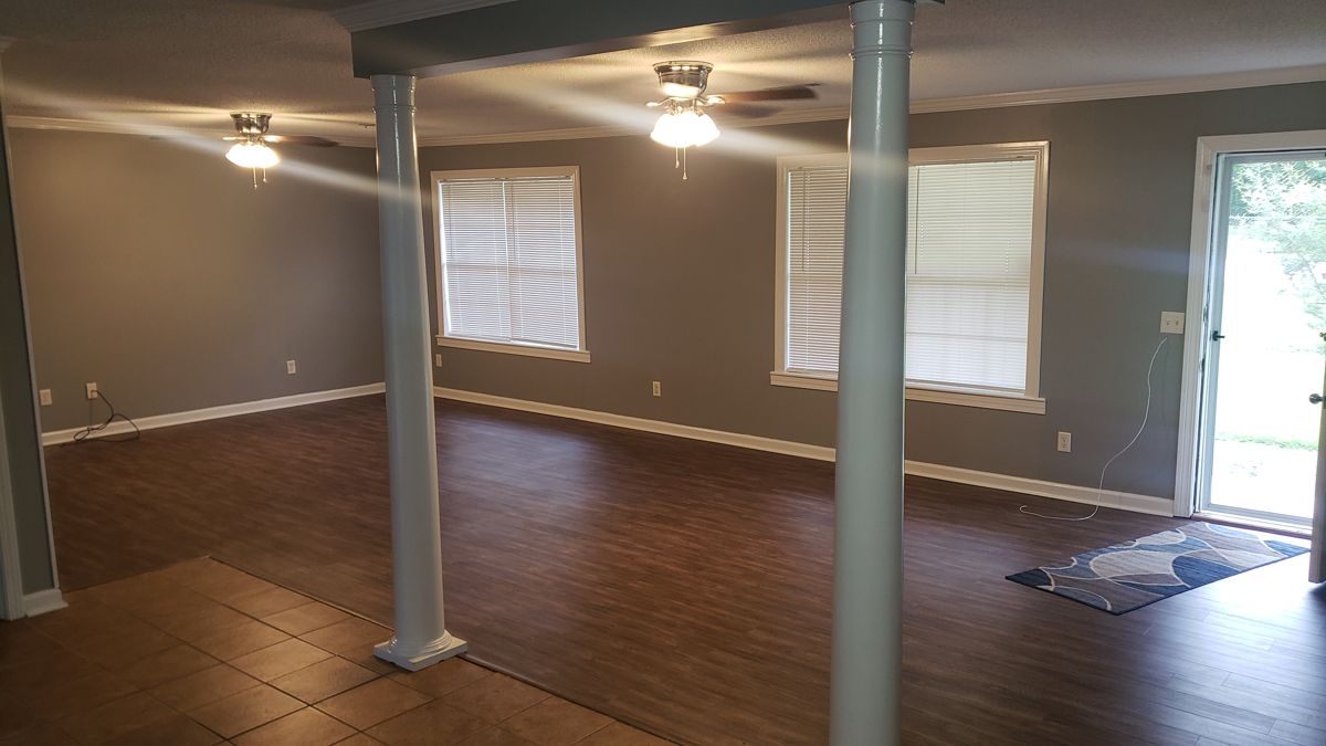 Living area with columns after remodel